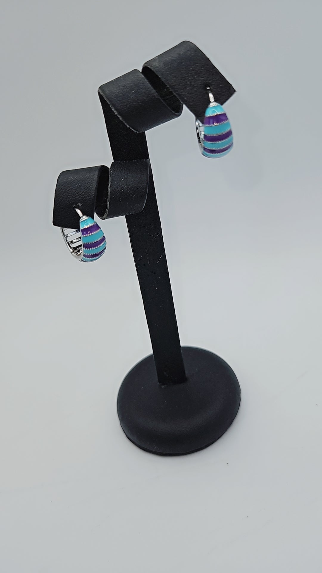 Earing blue and purple